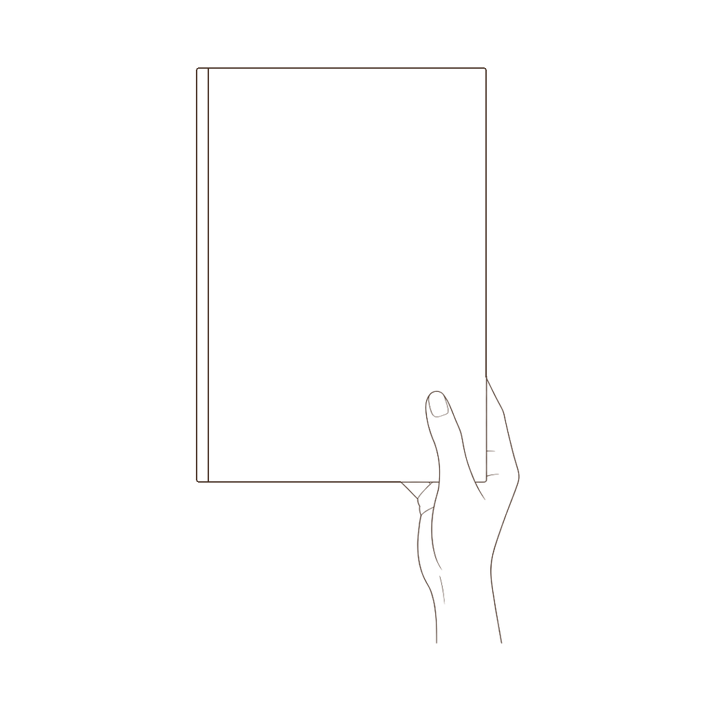 Hand holding an A4 coffee table book
